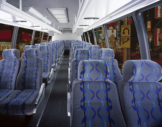 Interior of a luxury coach motor showcasing premium amenities and comfortable seating